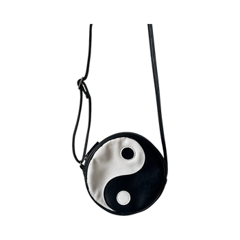 Pyöreä yin-yang olkalaukku