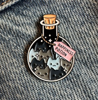 Happiness potion cat pin