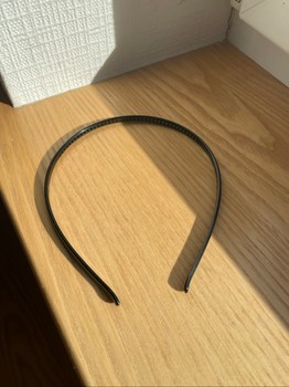 Black plastic headband