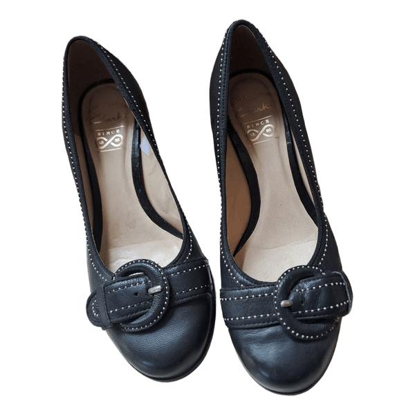 Black leather wedge shoes
