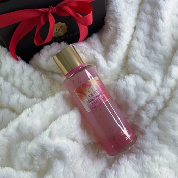 Pink body mist spray