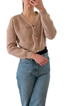 beige ribattu neuletakki