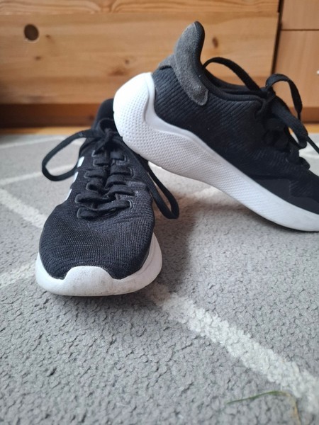 Black Adidas sneakers