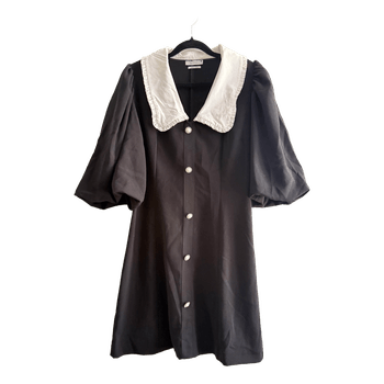 Black mini dress with white collar