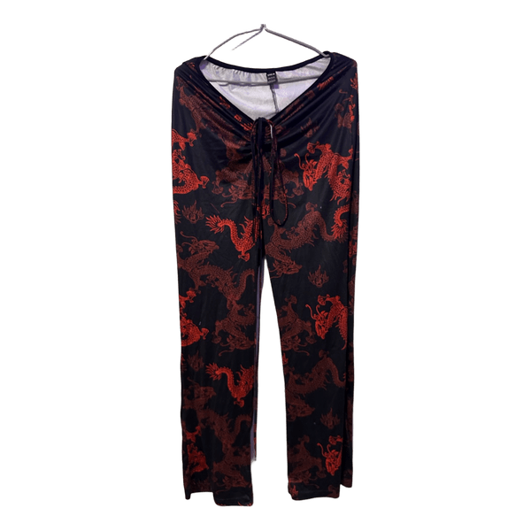 Black dragon print trousers