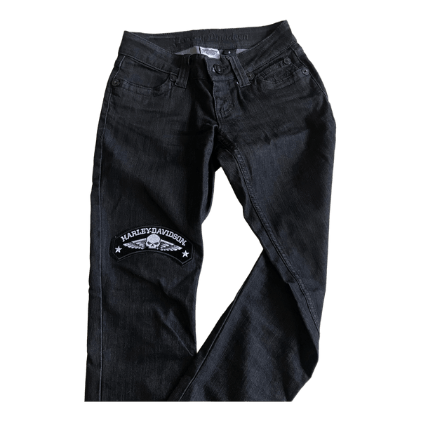 Black Harley-Davidson motorcycle  jeans