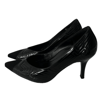 Black leather patent pumps