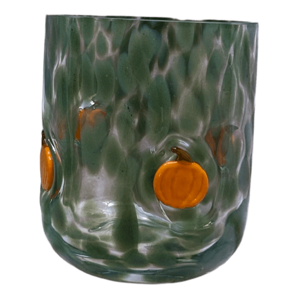 Green glass tumbler with pumpkins