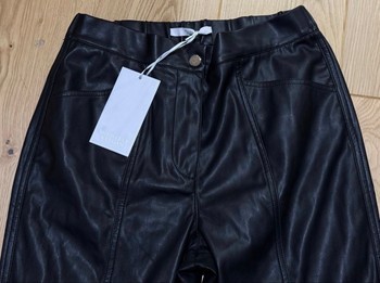 Black faux leather trousers