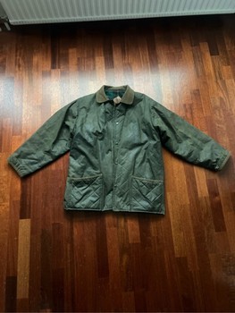 Green quilted waxed jacket