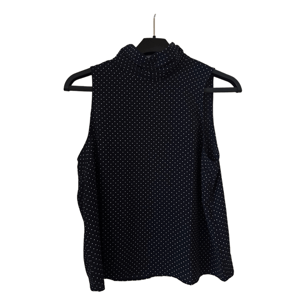 Mustavalkoinen pilkullinen toppi
