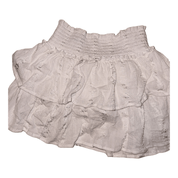 White ruffled mini skirt