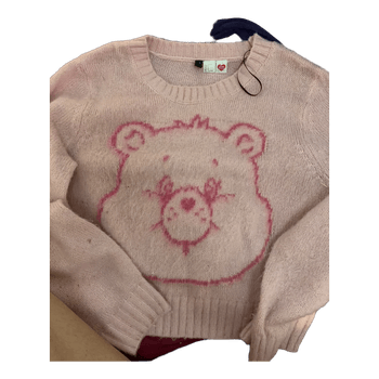 Vaaleanpunainen Care Bears -neule