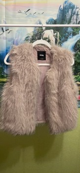 Beige faux fur vest