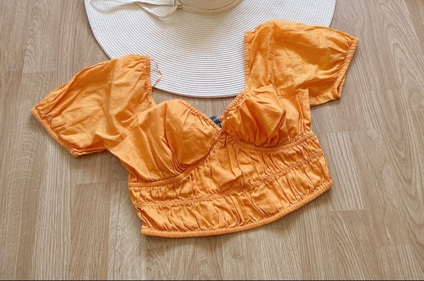 Kollane puuvillane topp