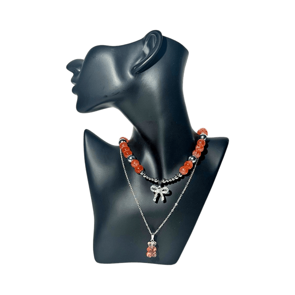 The bow and bear necklace 
