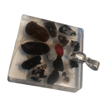 Uniikki Amuletti "Rattle of Rocks"
