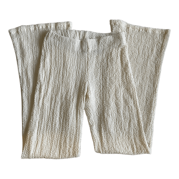 White textured flared trousers
