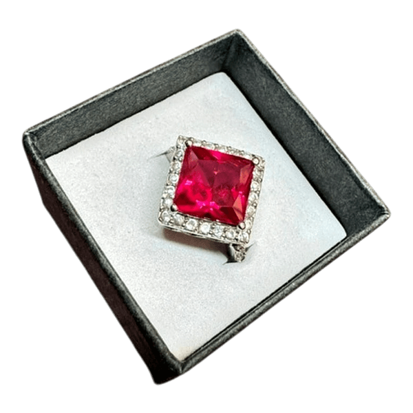 Silver 925, fancy ring with a reddish stone and cubic zirconias | NOS