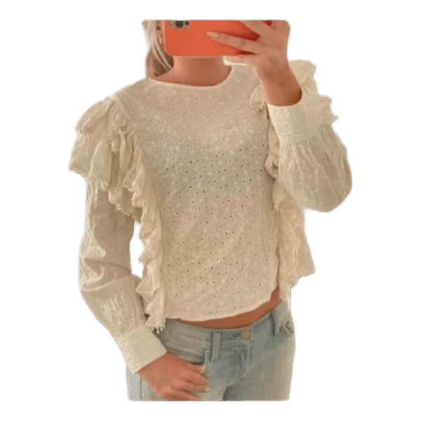 Vit blus med volanger