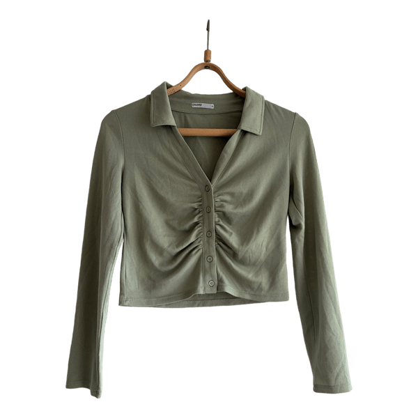 Green buttoned long-sleeve top