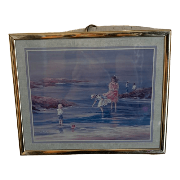 Indrammet billede med strandmotiv