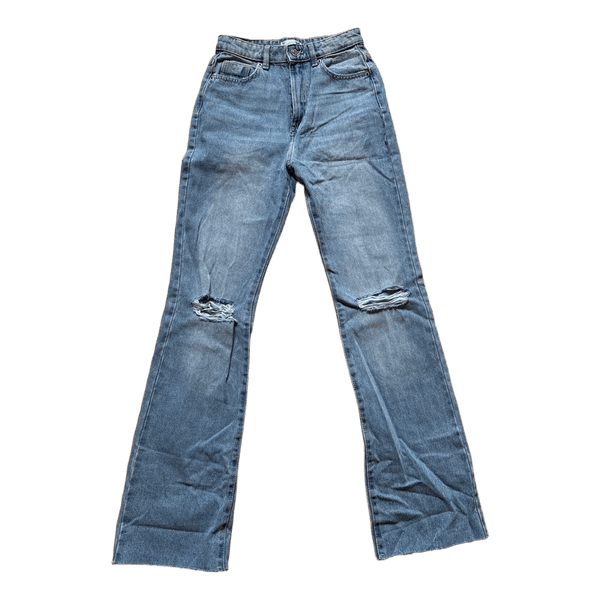 Blue distressed flared jeans