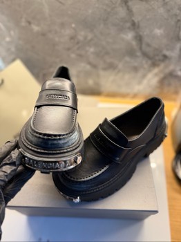 Balenciaga black leather loafers