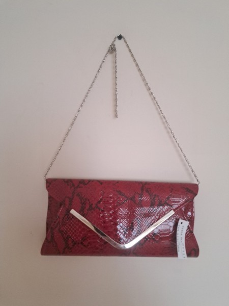 Red snake print clutch