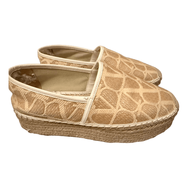 Beige espadrille flatforms
