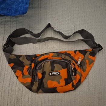 Oranssi camo vyölaukku