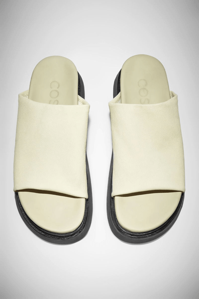 White leather platform slides