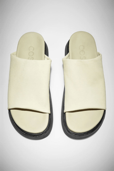 White leather platform slides