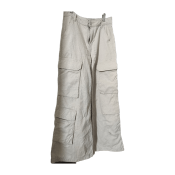 Beige leveälahkeiset housut
