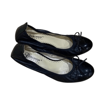Black patent wedge ballerinas