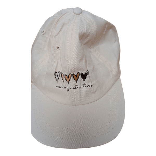 White embroidered baseball cap