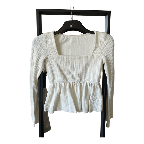 White long-sleeve top