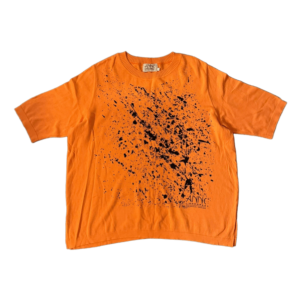 Oranssi kuvioitu neulepaita