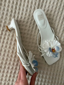 White orchid flower sandals