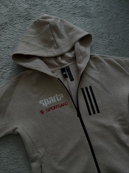 Beige Adidas tech-fleece hoodie with merch prints