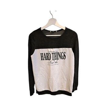 Harmaa-valkoinen pusero