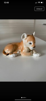Porcelain lion cub figurine