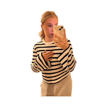 Valkoinen ja musta raidallinen paita