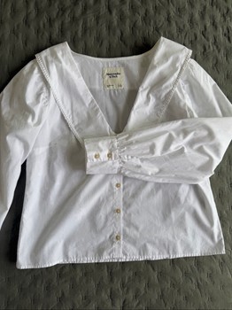 White collared button-down blouse