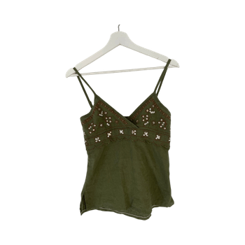 Vihreä hihaton toppi