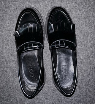 Black leather loafers