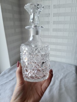 Glass carafe with a floral pattern