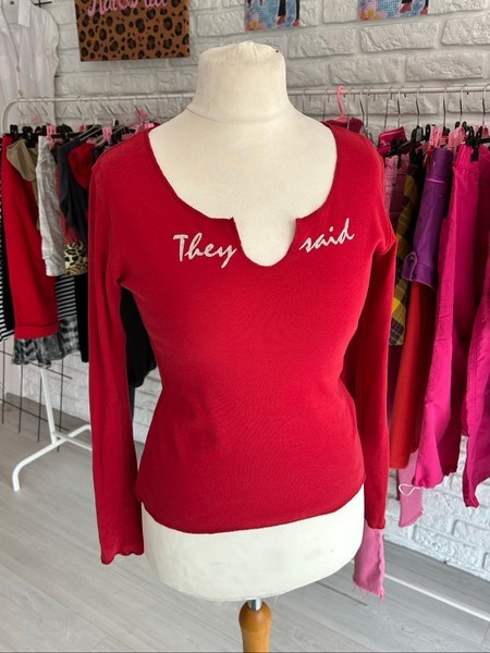red long-sleeved top