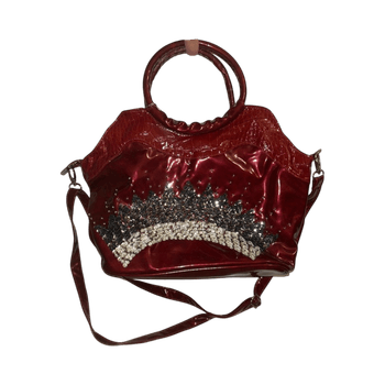 Vanha punainen käsilaukku