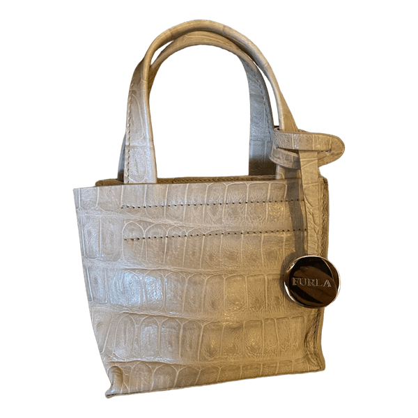 Beige Furla minilaukku